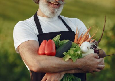 Mike's Garden Harvest - photo of veggie man in field